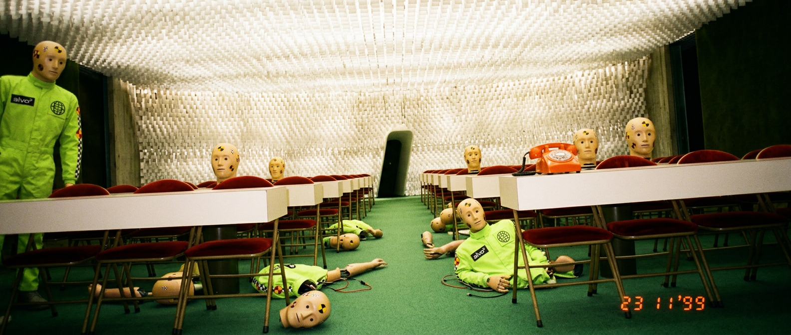 Alvo puppets in a foam-lined conference room